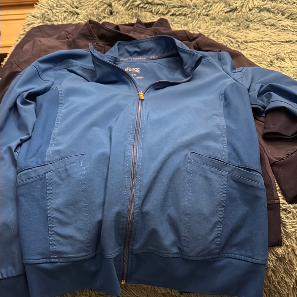 Blue women’s Cherokee infinity flex Jacket navy blue and ER blue